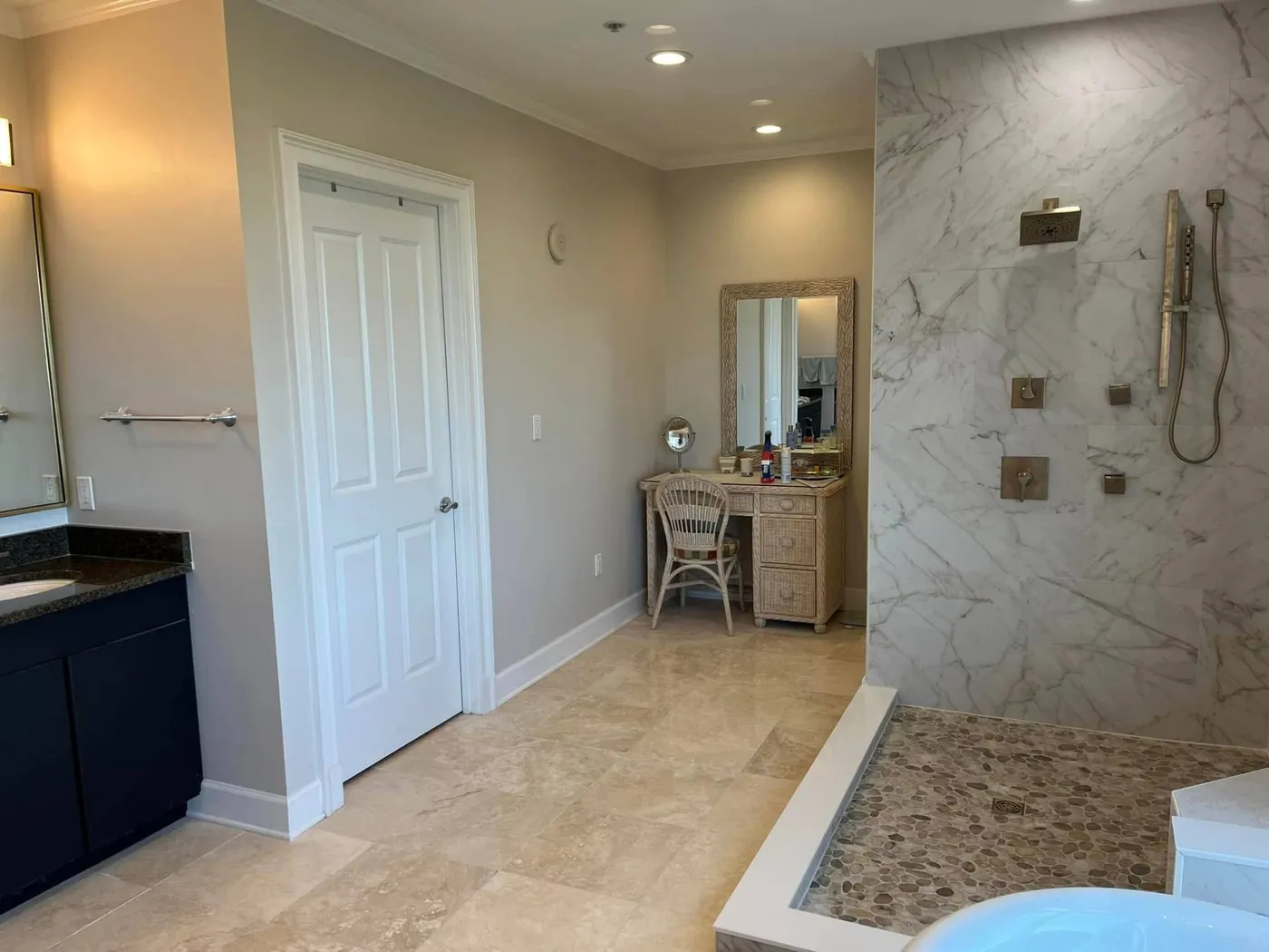 Master bathroom remodel with marble walk-in shower and freestanding tub by Lesher Contracting in Santa Rosa Beach, FL
